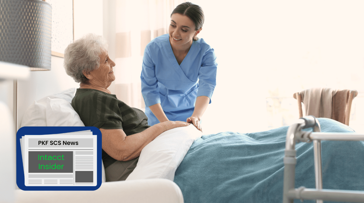 Carer putting resident to bed